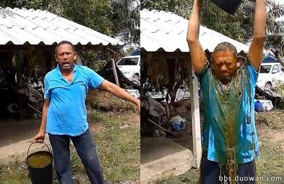泰国一大叔发起粪桶挑战